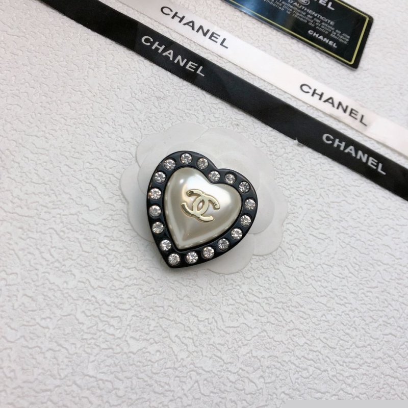 Ch*el brooches